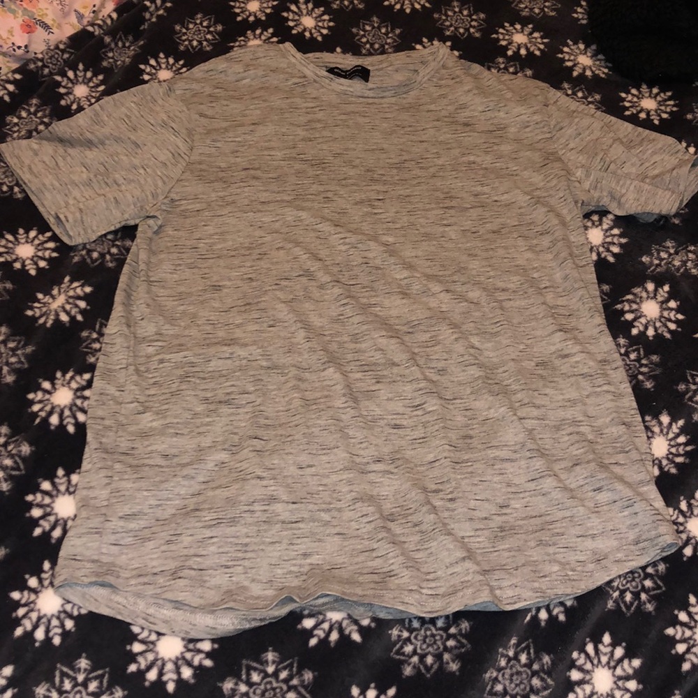 This is a ocean current large shirt for kids.